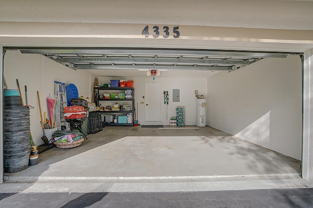 garage featuring electric panel, a garage door opener, and water heater