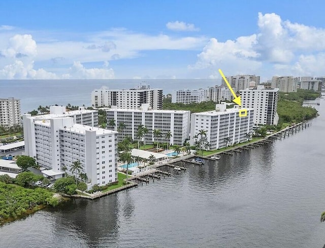 aerial view featuring a water view and a city view