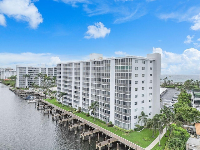 view of building exterior with a water view