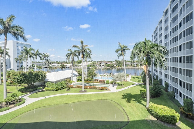 surrounding community featuring a water view