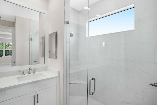 bathroom with vanity and an enclosed shower