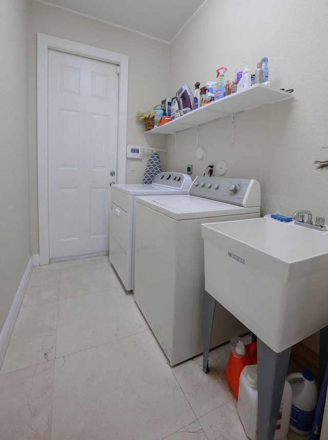 laundry room featuring washing machine and dryer