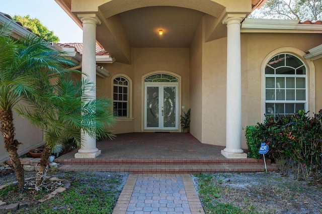 doorway to property with french doors