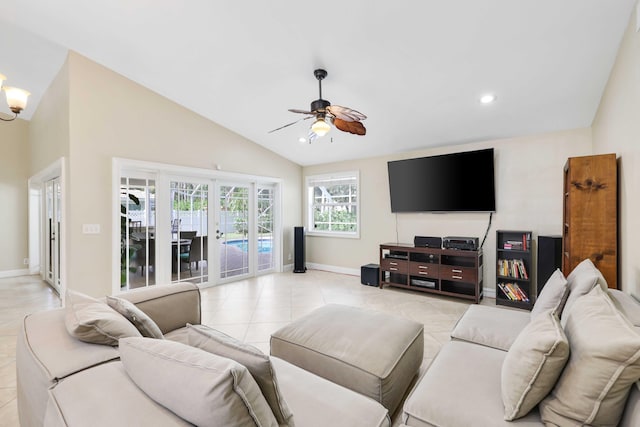 living room with french doors, vaulted ceiling, light tile patterned floors, and ceiling fan