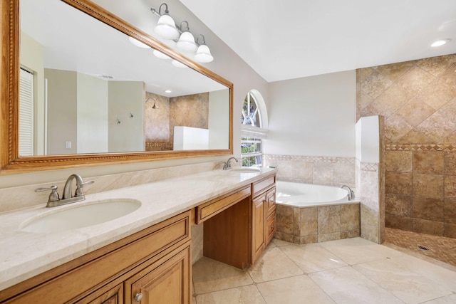 bathroom with vanity, tile patterned floors, and separate shower and tub