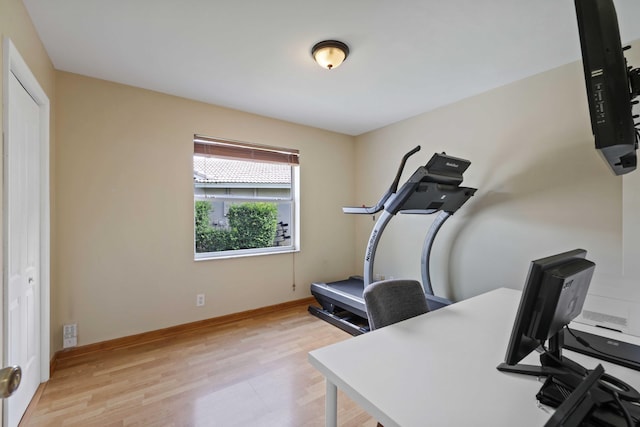 office with light hardwood / wood-style floors