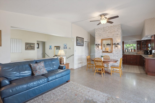 living room with vaulted ceiling and ceiling fan