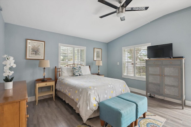 bedroom featuring vaulted ceiling, ceiling fan, and hardwood / wood-style floors