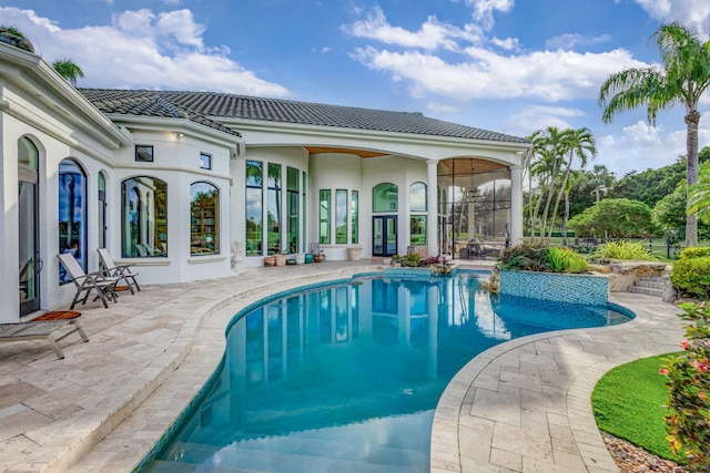 view of swimming pool with a patio area