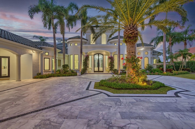 mediterranean / spanish house with french doors