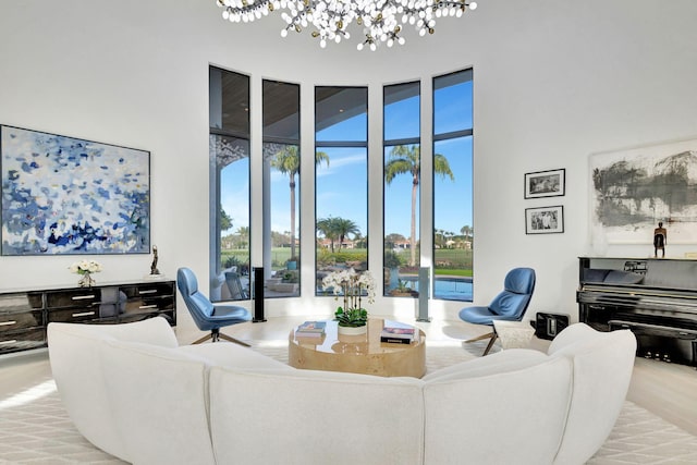 living room with a notable chandelier