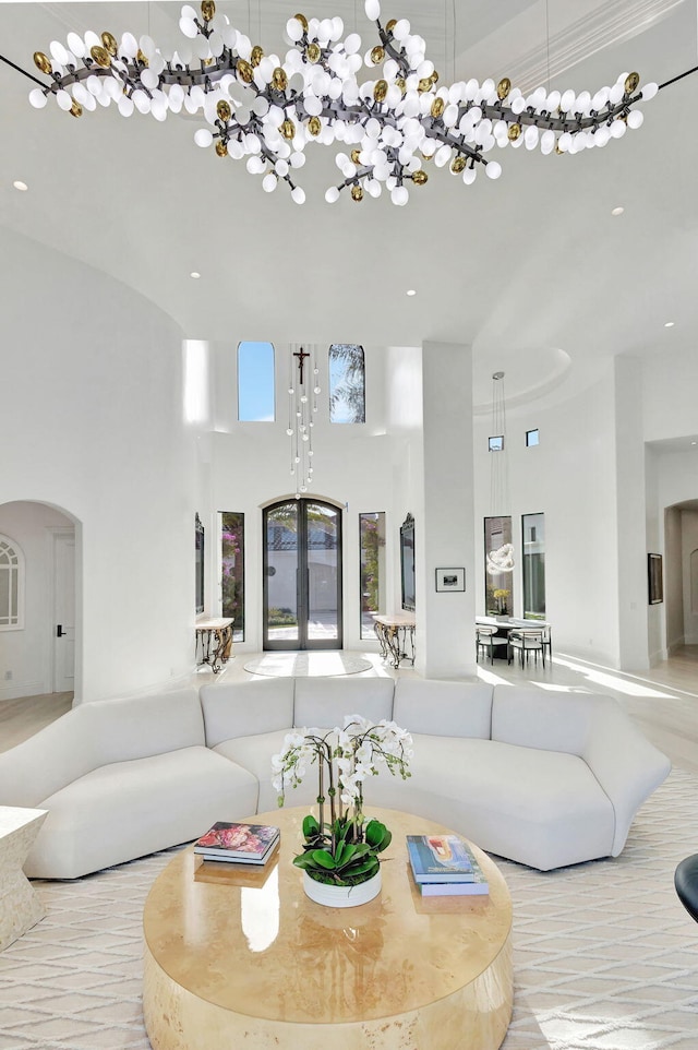 living room with a towering ceiling