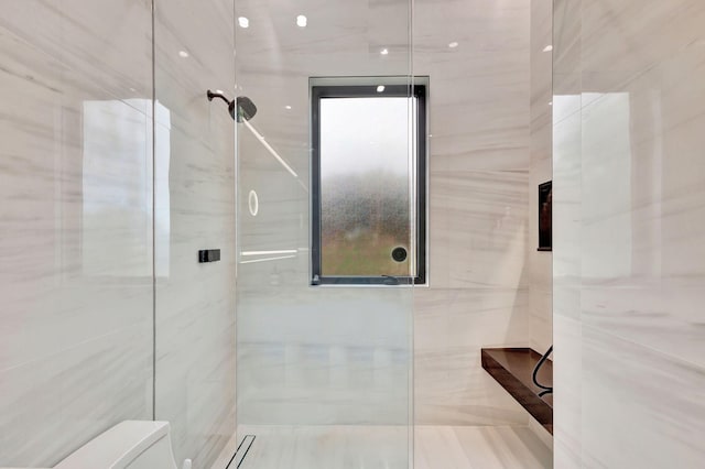 bathroom featuring an enclosed shower