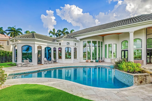 view of swimming pool featuring a patio