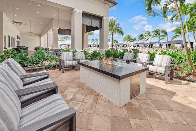 view of patio featuring ceiling fan