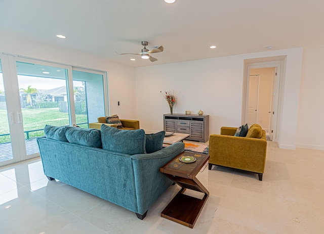 tiled living room with ceiling fan