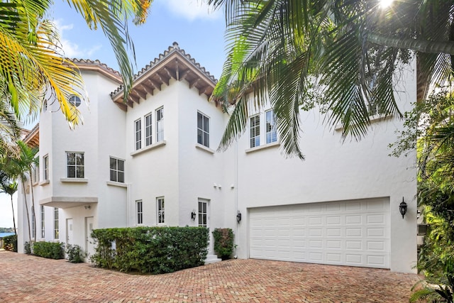 view of front of property featuring a garage