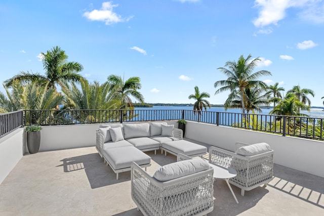 view of patio / terrace featuring an outdoor living space and a water view