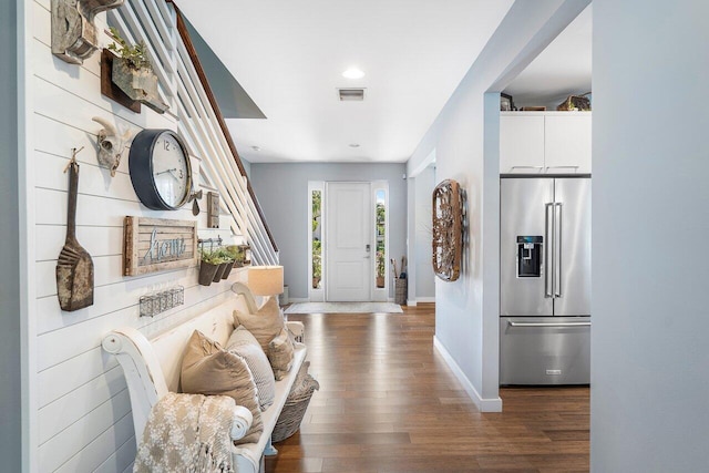 foyer entrance with dark wood-type flooring