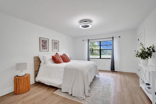 bedroom with light hardwood / wood-style flooring