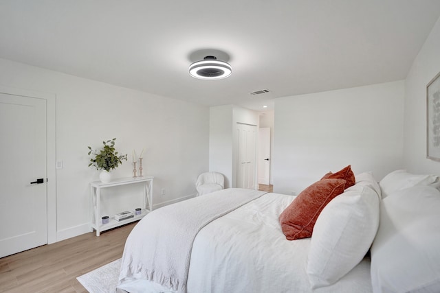 bedroom with light hardwood / wood-style floors