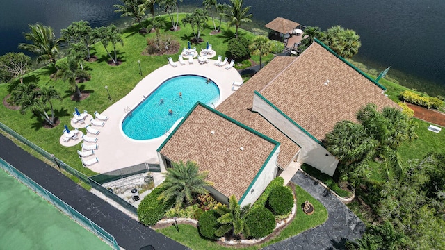 birds eye view of property featuring a water view