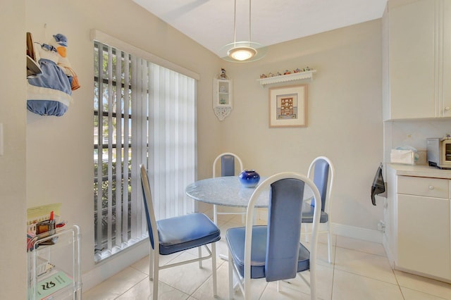 dining room featuring light tile patterned floors