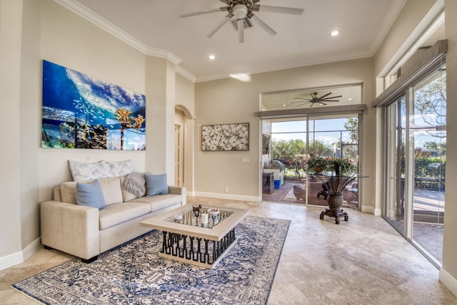 living room featuring crown molding and ceiling fan