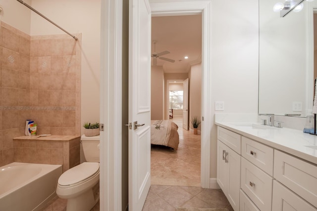 full bathroom featuring ceiling fan, tile patterned floors, bathing tub / shower combination, toilet, and vanity