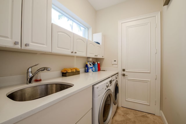 7541 Monte Verde Ln, West Palm Beach, FL 33412 - clothes washing area with cabinet space, washer and dryer, and baseboards