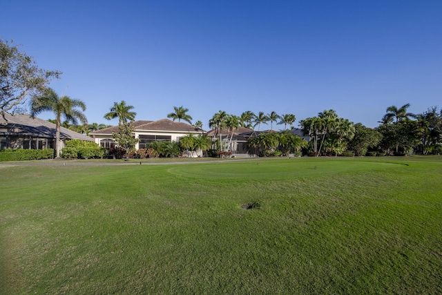 7541 Monte Verde Ln, West Palm Beach, FL 33412 - view of front facade with a front lawn and golf course view