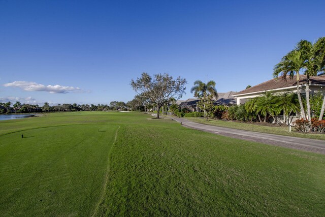 7541 Monte Verde Ln, West Palm Beach, FL 33412 - view of green lawn with a water view and golf course view