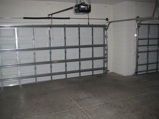 garage featuring a garage door opener