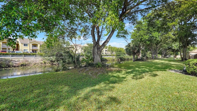 view of yard with a water view