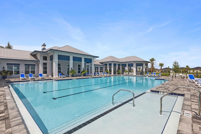 view of swimming pool featuring a patio