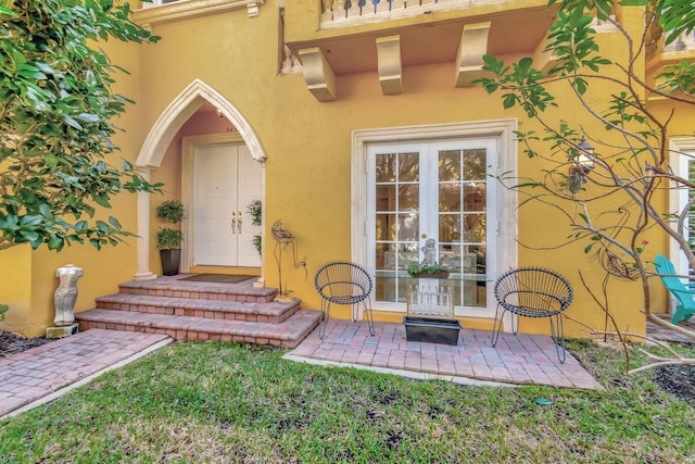 view of exterior entry with french doors