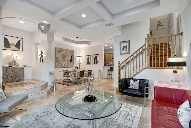 living room featuring beam ceiling, decorative columns, and coffered ceiling