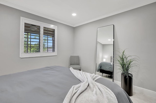 bedroom with crown molding