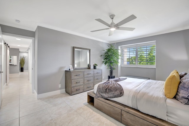 tiled bedroom with ceiling fan, a barn door, and crown molding