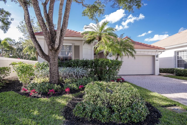 view of front of property featuring a garage