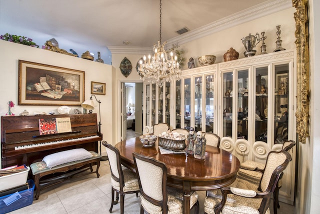 dining area with an inviting chandelier, crown molding, and light tile patterned flooring