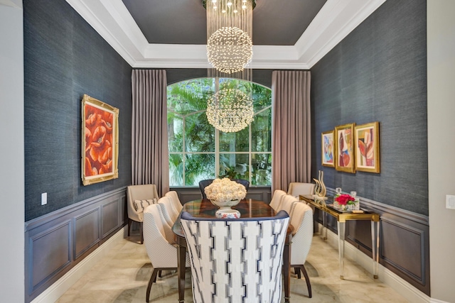 dining room with crown molding and an inviting chandelier