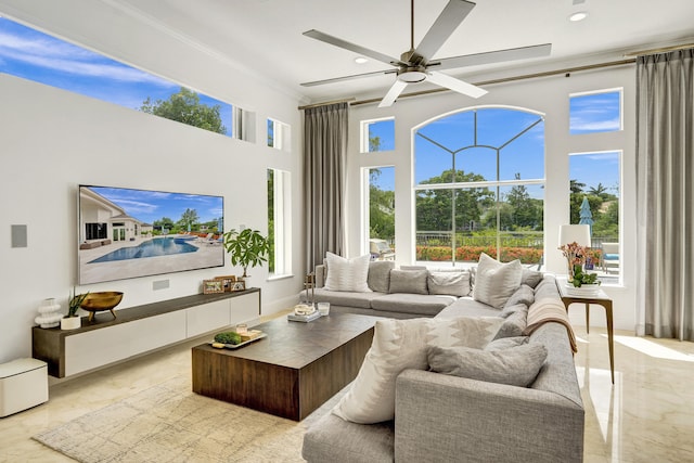 sunroom with ceiling fan and a healthy amount of sunlight