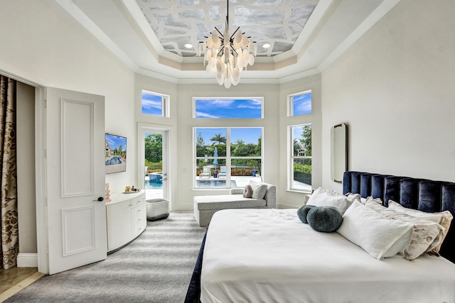 carpeted bedroom with a chandelier, multiple windows, ornamental molding, and coffered ceiling