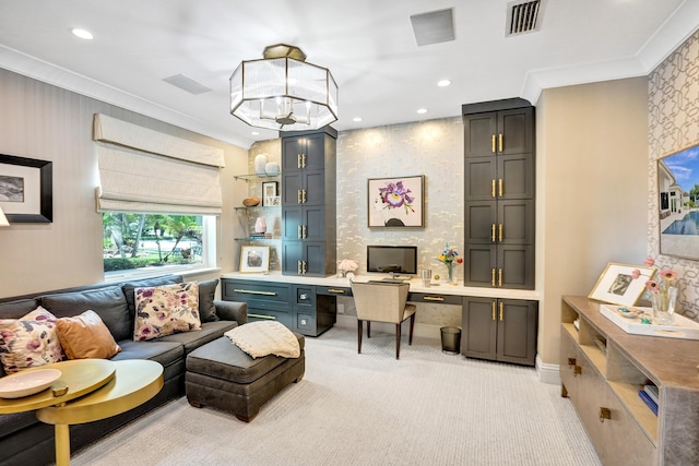 home office featuring built in desk, crown molding, light carpet, and an inviting chandelier