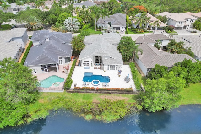 bird's eye view with a water view