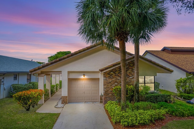 view of front of home featuring a garage