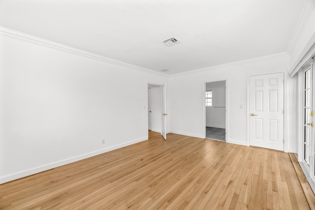 unfurnished bedroom with a closet, light hardwood / wood-style flooring, and crown molding