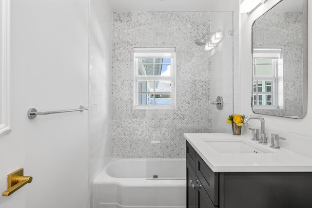 bathroom featuring shower / bathing tub combination and vanity