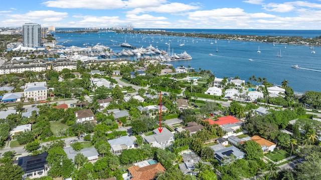 birds eye view of property featuring a water view